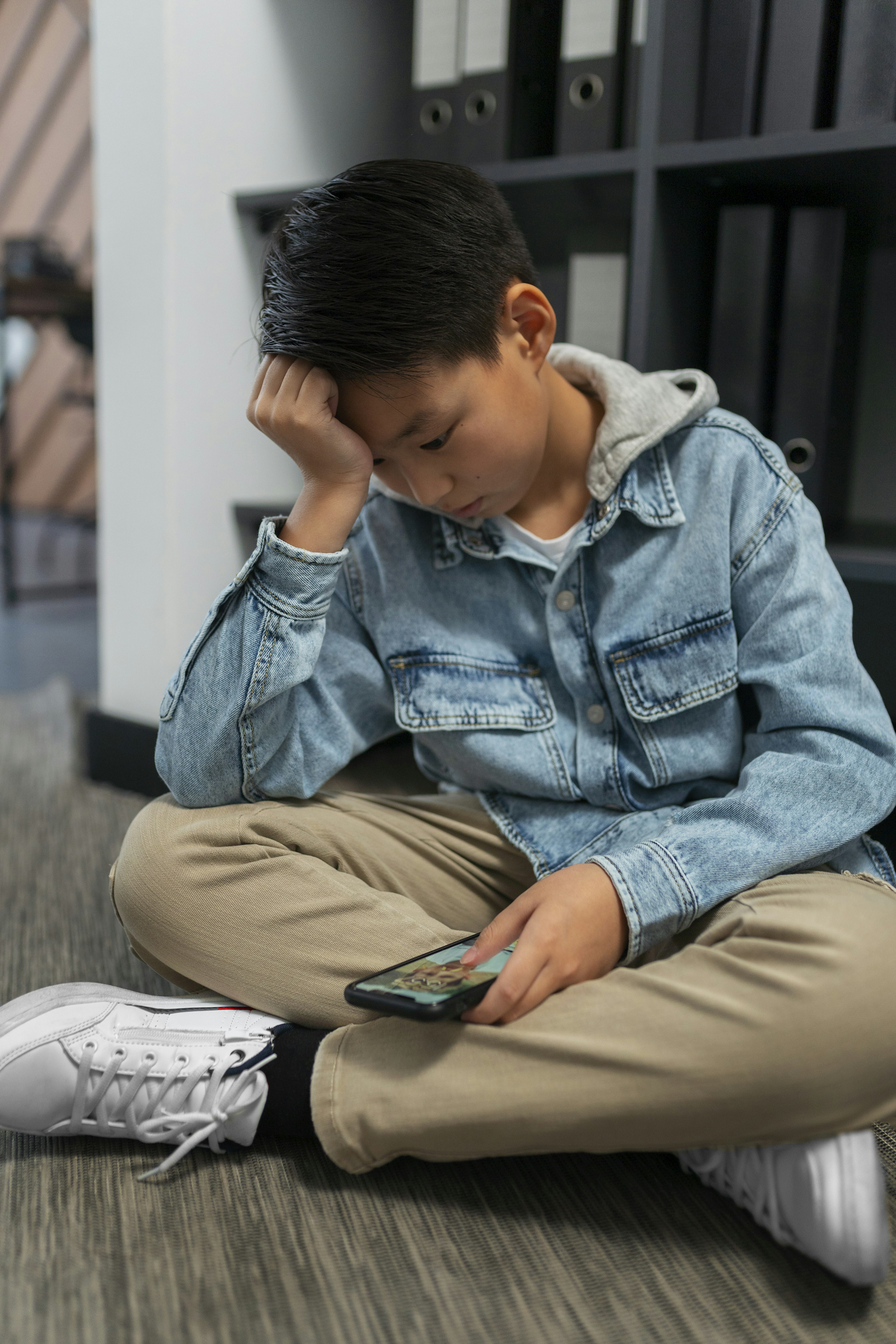 Boy being cyberbullied